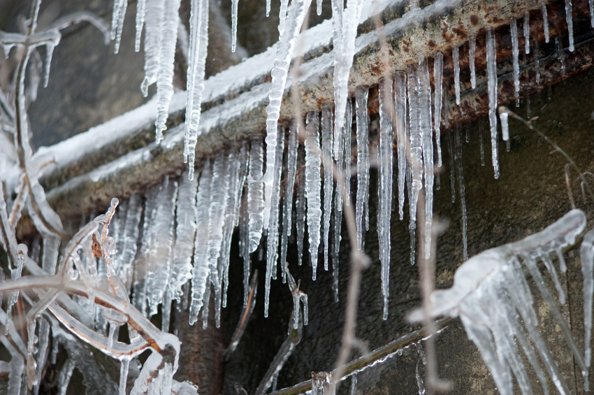 Frozen pipes with hanging ice