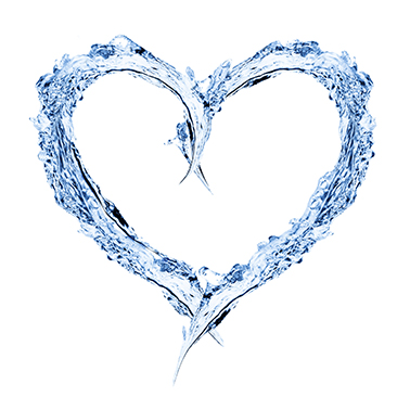 Water forming heart shape over white background
