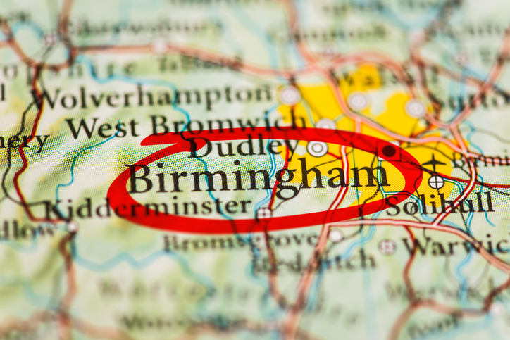 Birmingham city circled with red marker on map. Close up shot