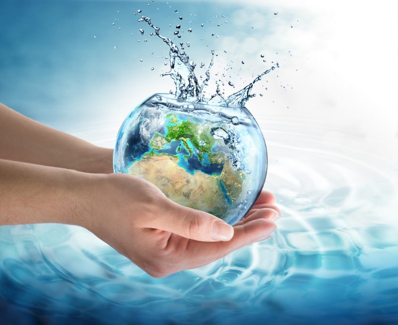 water conservation in Europe - water globe in the hands