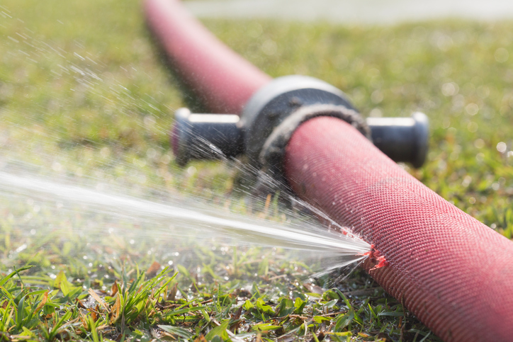 water leaking from hole in a hose