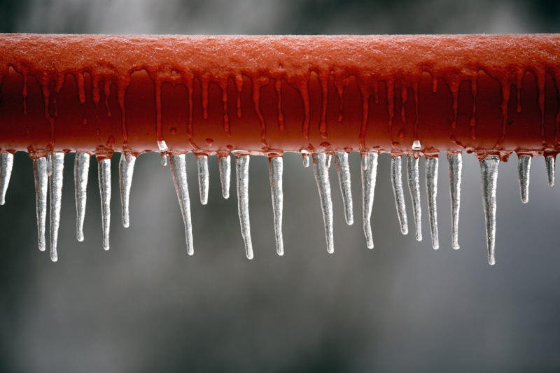 red frozen metal bar