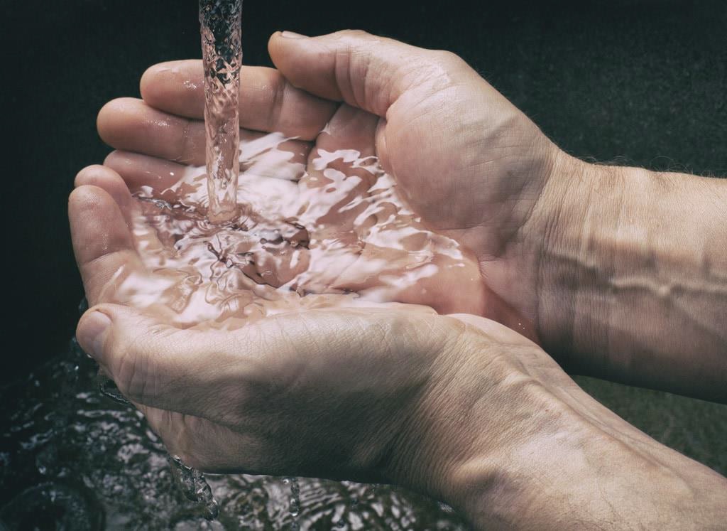 hands cupping water