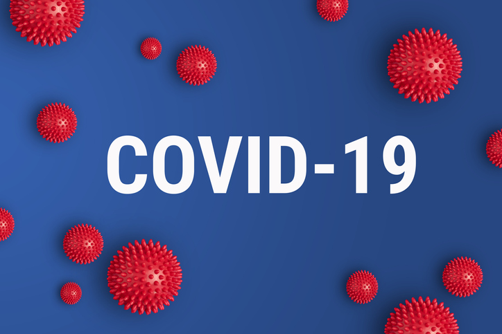 inscription COVID-19 on blue background.