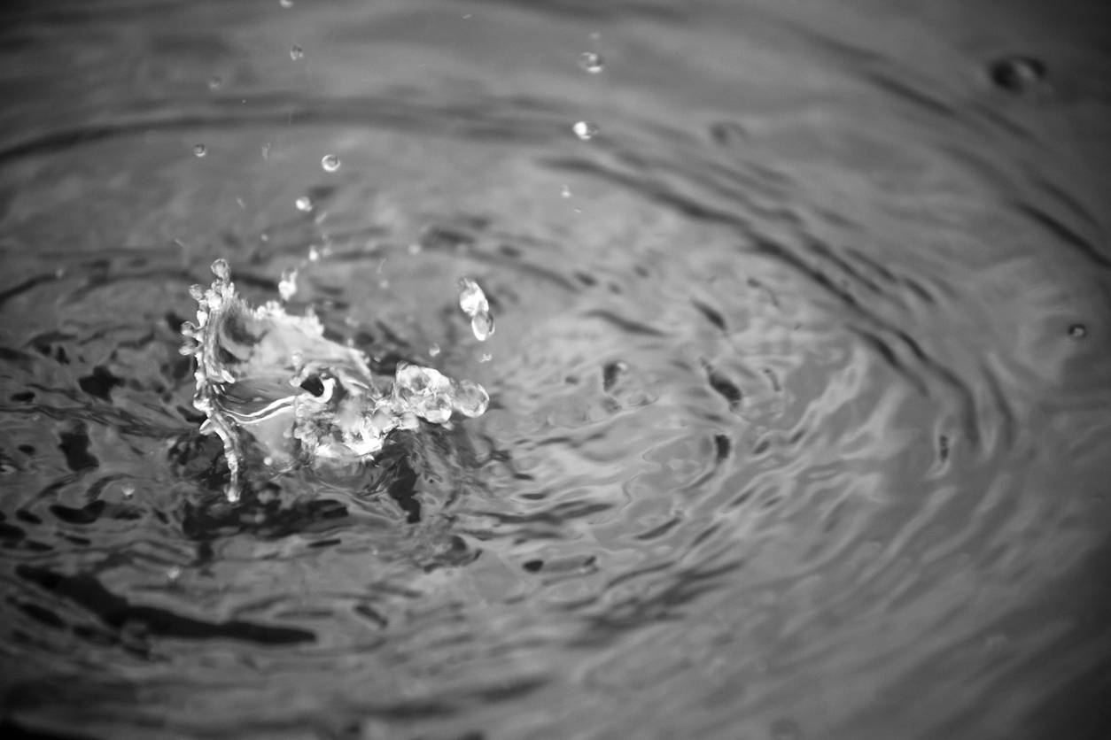 Water fountain, spurt and water surface.