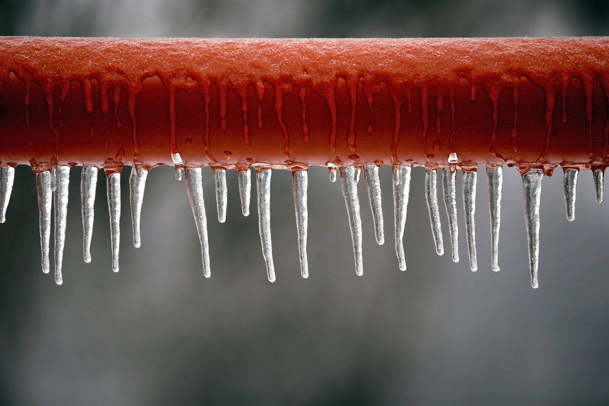 Frozen red water pipe