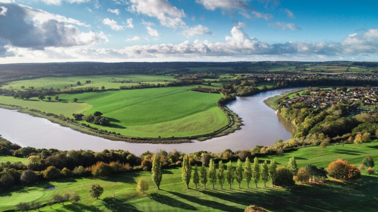 A drone landscape of Bristol, UK, with the River Severn snaking its way through the surrounds