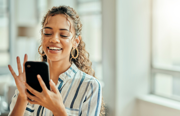 woman typing on a phone for communication